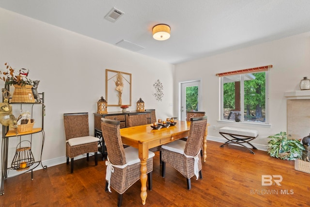 8664 Foxtail Loop, Pensacola, FL 32526 - dining room with wood finished floors and baseboards