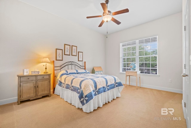 8664 Foxtail Loop, Pensacola, FL 32526 - bedroom with baseboards, light carpet, and ceiling fan
