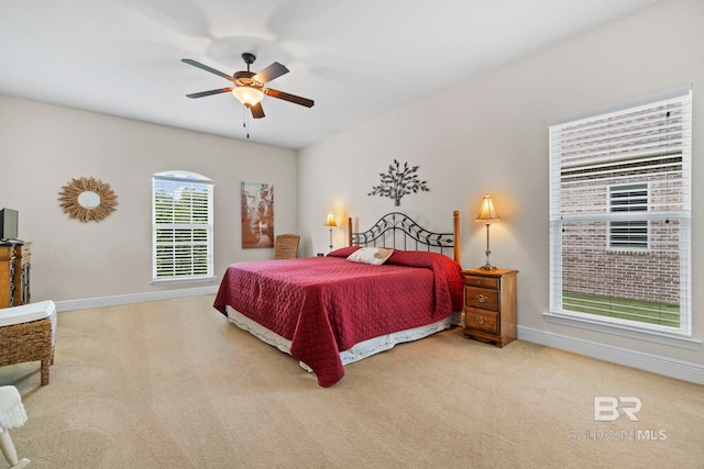 8664 Foxtail Loop, Pensacola, FL 32526 - carpeted bedroom with baseboards and a ceiling fan