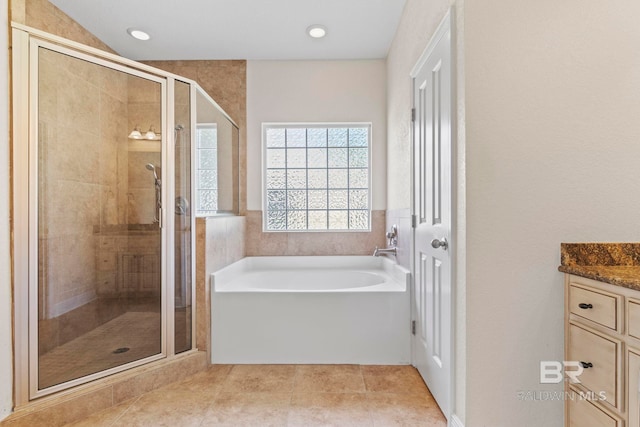 8664 Foxtail Loop, Pensacola, FL 32526 - full bathroom featuring a bath, a stall shower, vanity, tile patterned floors, and recessed lighting