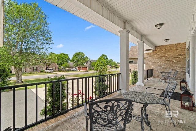 8664 Foxtail Loop, Pensacola, FL 32526 - balcony featuring a porch and a residential view