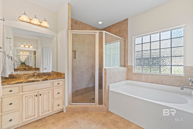 8664 Foxtail Loop, Pensacola, FL 32526 - bathroom with a shower stall, a bath, tile patterned flooring, and vanity