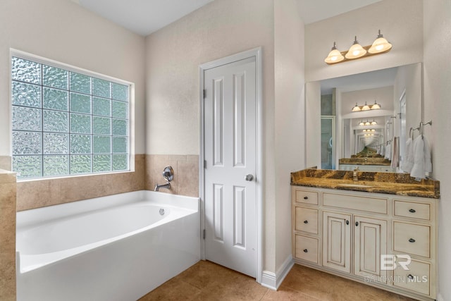 8664 Foxtail Loop, Pensacola, FL 32526 - bathroom with a bath, tile patterned floors, and vanity