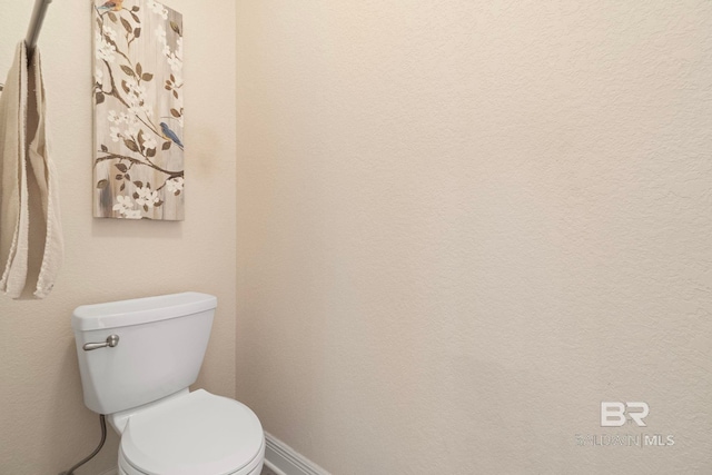 8664 Foxtail Loop, Pensacola, FL 32526 - bathroom with baseboards and toilet