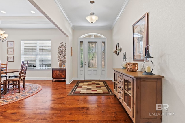 8664 Foxtail Loop, Pensacola, FL 32526 - entryway featuring ornamental molding, a chandelier, dark wood finished floors, and baseboards
