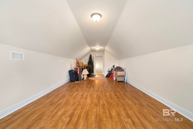 8664 Foxtail Loop, Pensacola, FL 32526 - bonus room featuring vaulted ceiling, wood finished floors, and baseboards