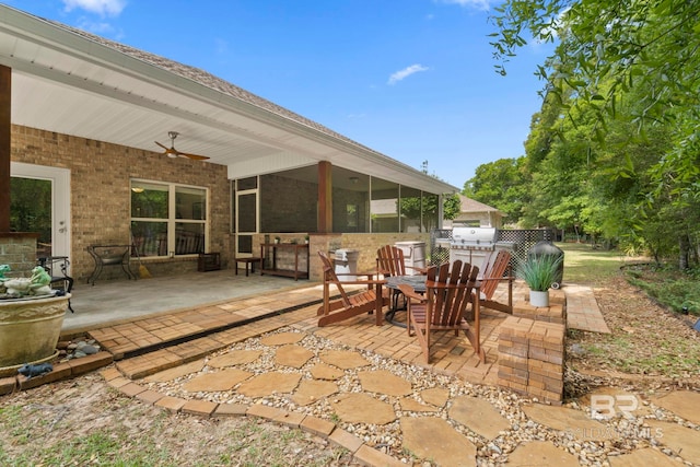 8664 Foxtail Loop, Pensacola, FL 32526 - view of patio / terrace with ceiling fan, a sunroom, and outdoor dining area