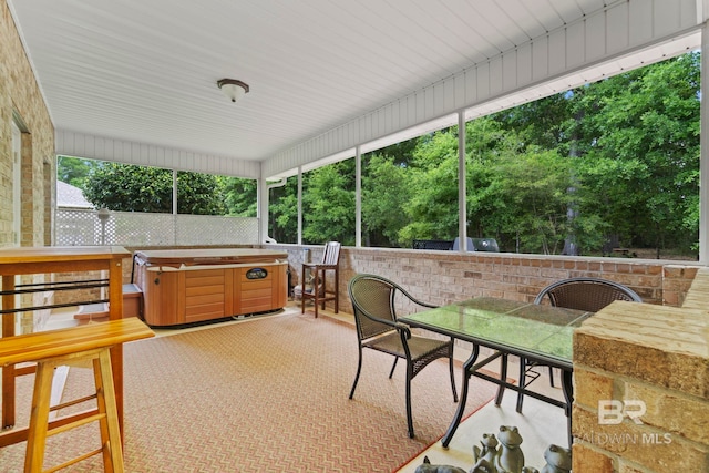8664 Foxtail Loop, Pensacola, FL 32526 - view of patio featuring a hot tub, outdoor dining area, and fence