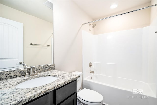 full bathroom with shower / washtub combination, toilet, and vanity