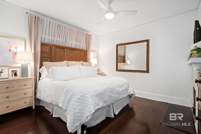 bedroom featuring dark hardwood / wood-style floors and ceiling fan