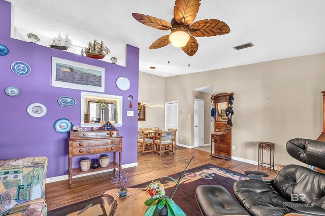 2200 W 2nd St Unit 301-C, Gulf Shores, AL 36542 - living room featuring ceiling fan and wood finished floors