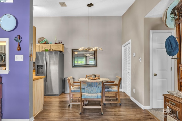 2200 W 2nd St Unit 301-C, Gulf Shores, AL 36542 - dining area with wood finished floors