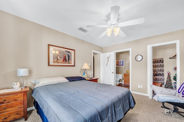 2200 W 2nd St Unit 301-C, Gulf Shores, AL 36542 - bedroom featuring carpet, ceiling fan, and ensuite bath