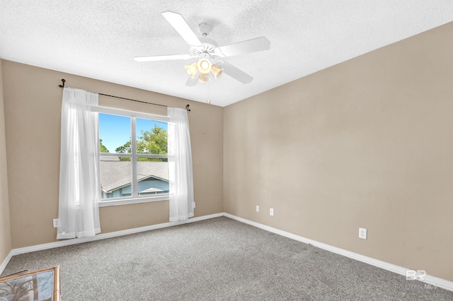 2200 W 2nd St Unit 301-C, Gulf Shores, AL 36542 - carpeted empty room featuring ceiling fan and a textured ceiling