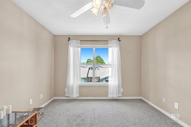 2200 W 2nd St Unit 301-C, Gulf Shores, AL 36542 - carpeted empty room featuring ceiling fan and a textured ceiling