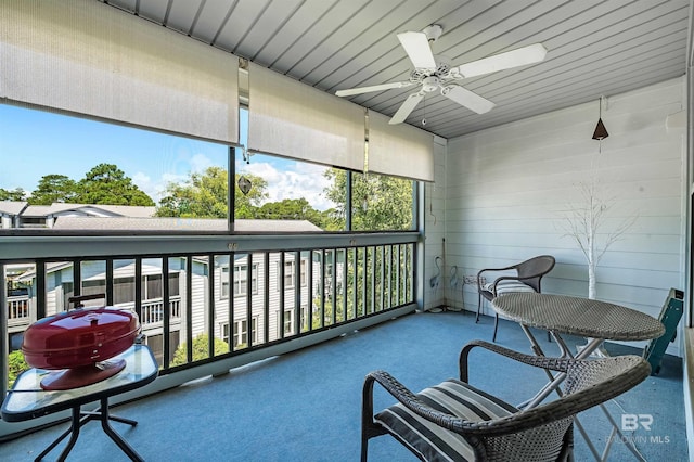 2200 W 2nd St Unit 301-C, Gulf Shores, AL 36542 - sunroom featuring a ceiling fan