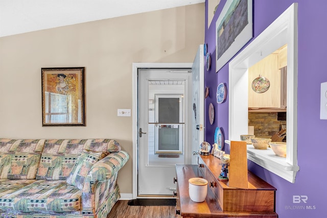 2200 W 2nd St Unit 301-C, Gulf Shores, AL 36542 - living area with wood finished floors and baseboards