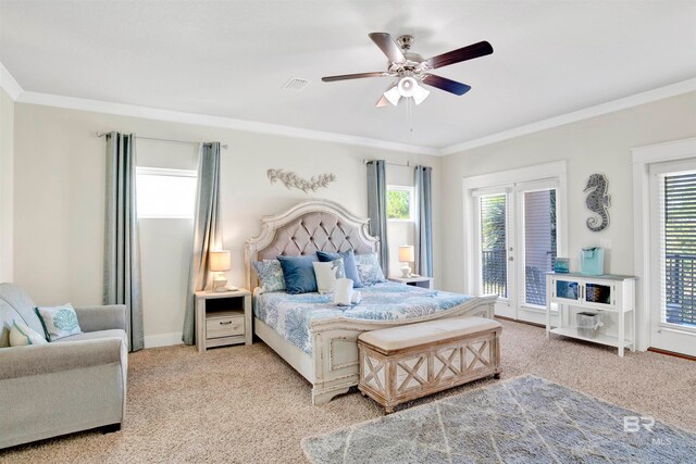 carpeted bedroom with ceiling fan, ornamental molding, and access to outside