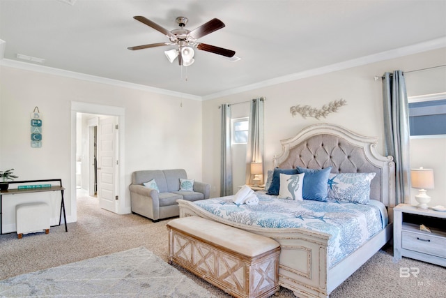 bedroom with ceiling fan, light carpet, and ornamental molding