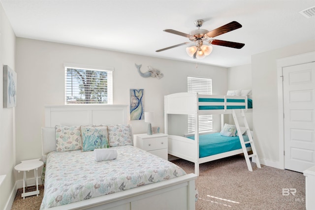 bedroom featuring ceiling fan and carpet floors