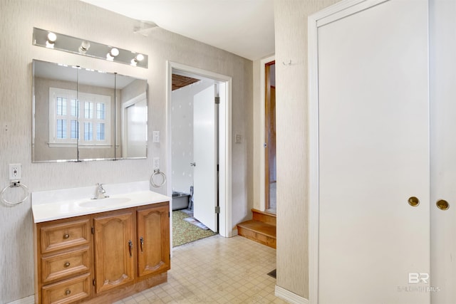 bathroom featuring tile patterned floors and vanity