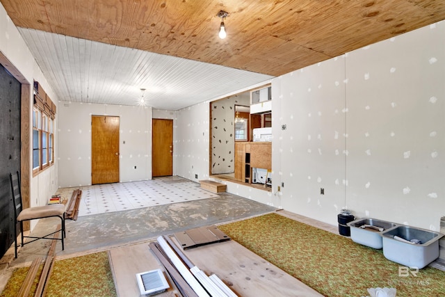 interior space featuring wood ceiling