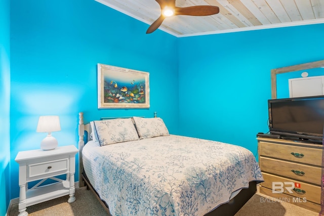 carpeted bedroom with wooden ceiling, ceiling fan, and crown molding