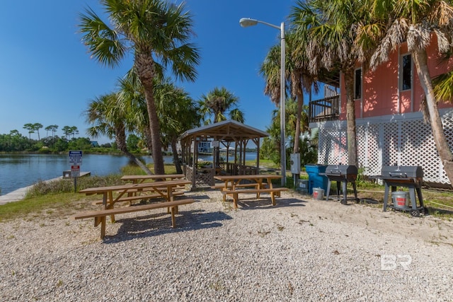 view of community featuring a gazebo and a water view