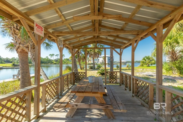 view of dock featuring a water view and a gazebo