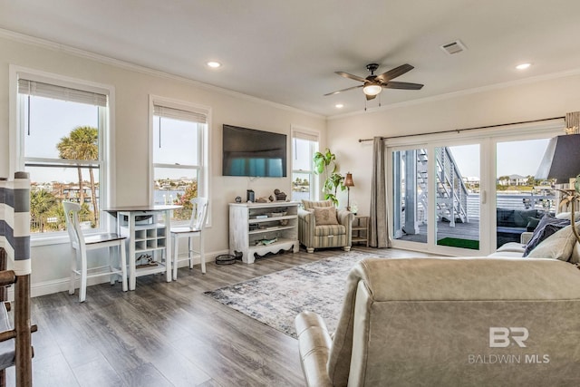 17290 Perdido Key Dr Unit A1, Pensacola, FL 32507 - living room featuring plenty of natural light, visible vents, crown molding, and ceiling fan