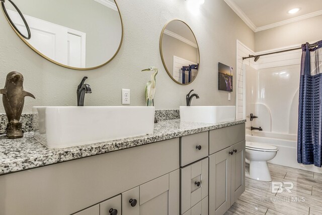 17290 Perdido Key Dr Unit A1, Pensacola, FL 32507 - full bath featuring double vanity, shower / tub combo with curtain, ornamental molding, and a sink