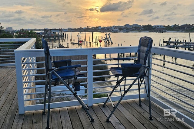 deck at dusk with a water view