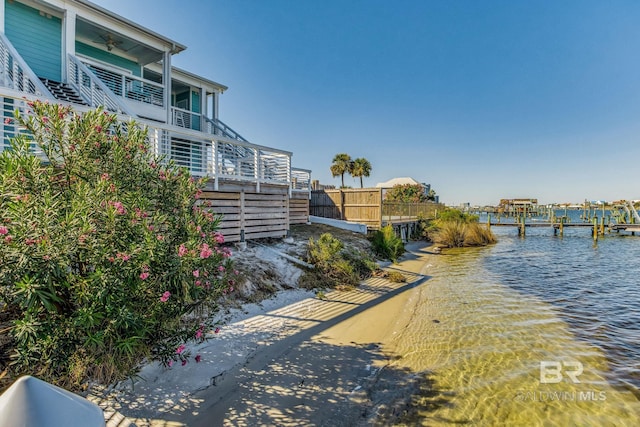 17290 Perdido Key Dr Unit A1, Pensacola, FL 32507 - exterior space with fence, a dock, and stairs