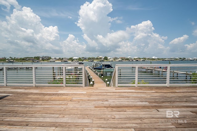 deck featuring a water view