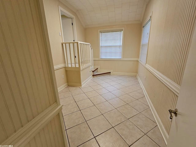 interior space featuring light tile floors