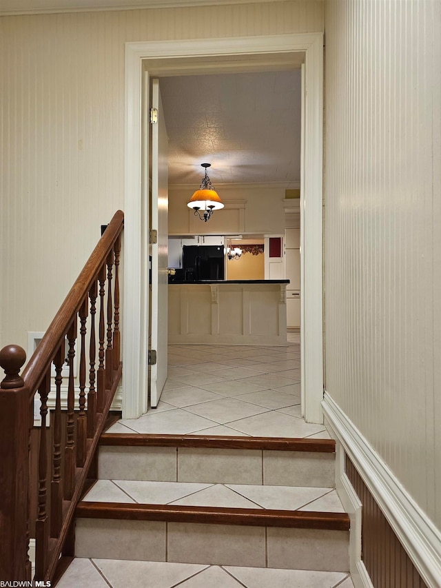 stairs with light tile floors