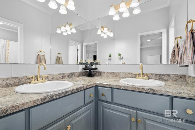 5570 Bay La Launch Ave, Orange Beach, AL 36561 - bathroom with backsplash and double vanity