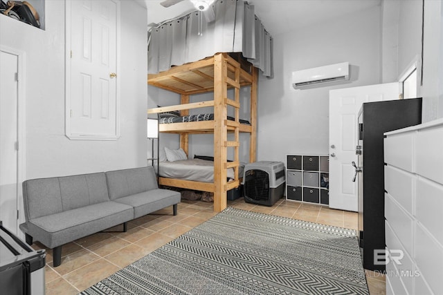 5570 Bay La Launch Ave, Orange Beach, AL 36561 - bedroom with a wall mounted AC and light tile patterned floors