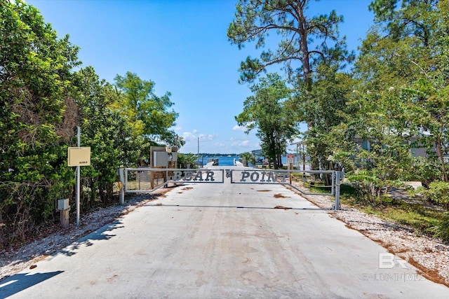 5570 Bay La Launch Ave, Orange Beach, AL 36561 - view of concrete surface with a gate and a gated entry