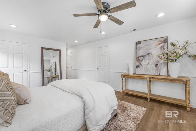 bedroom featuring recessed lighting, visible vents, and wood finished floors