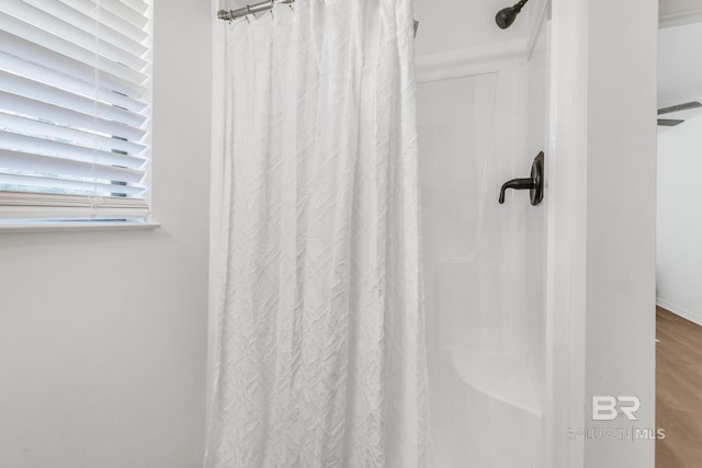 bathroom with curtained shower