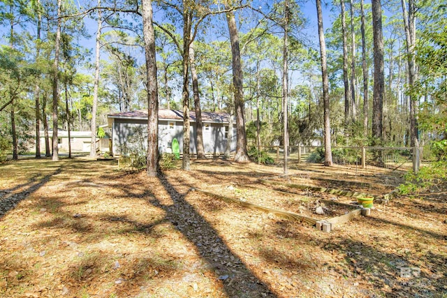 view of yard featuring fence