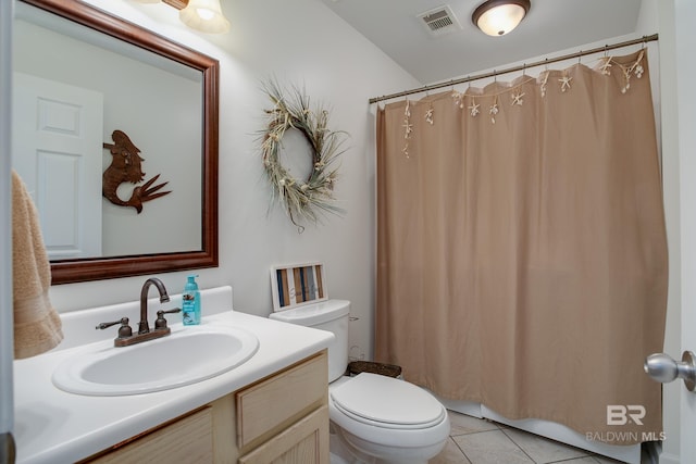 bathroom featuring visible vents, toilet, a shower with curtain, tile patterned floors, and vanity