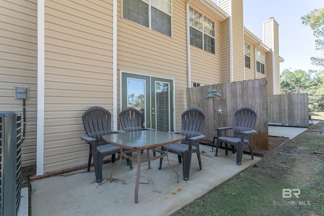 view of patio / terrace with outdoor dining space and fence