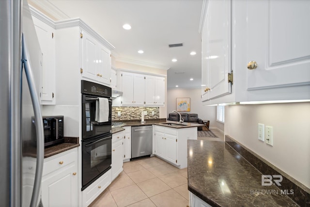 kitchen featuring white cabinetry, sink, kitchen peninsula, and black appliances