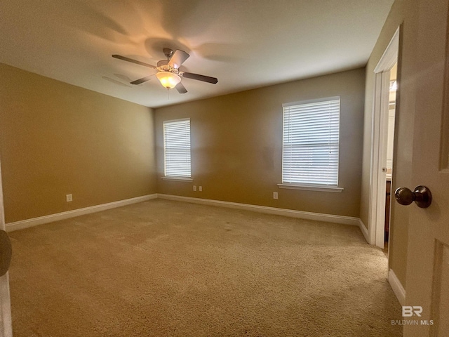 8185 Savage Loop, Theodore, AL 36582 - unfurnished room with light colored carpet and ceiling fan