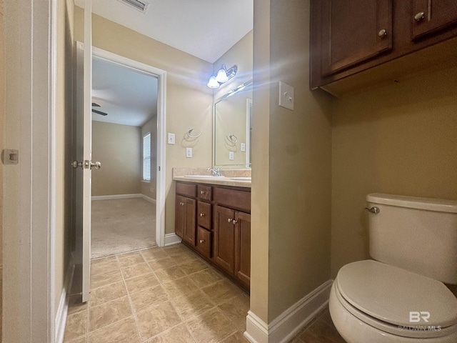 8185 Savage Loop, Theodore, AL 36582 - bathroom featuring double vanity and toilet