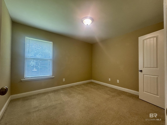 8185 Savage Loop, Theodore, AL 36582 - empty room featuring carpet and baseboards
