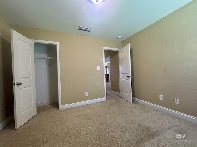 8185 Savage Loop, Theodore, AL 36582 - unfurnished bedroom featuring light carpet and a closet
