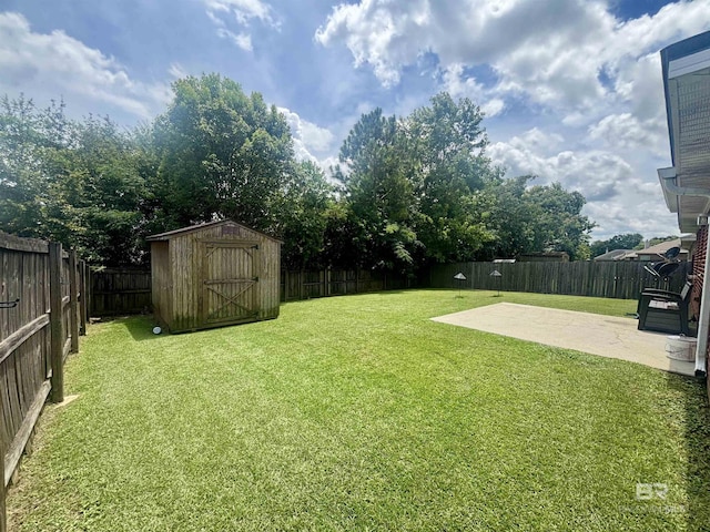 8185 Savage Loop, Theodore, AL 36582 - fenced backyard with a patio and a storage shed